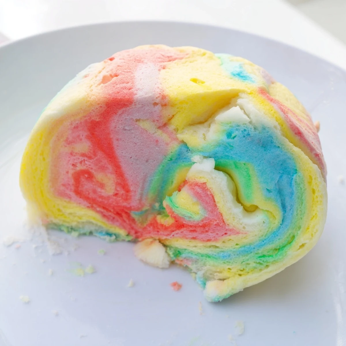 Fluffy cloud bread in rainbow colors, perfect for a fun breakfast treat.  