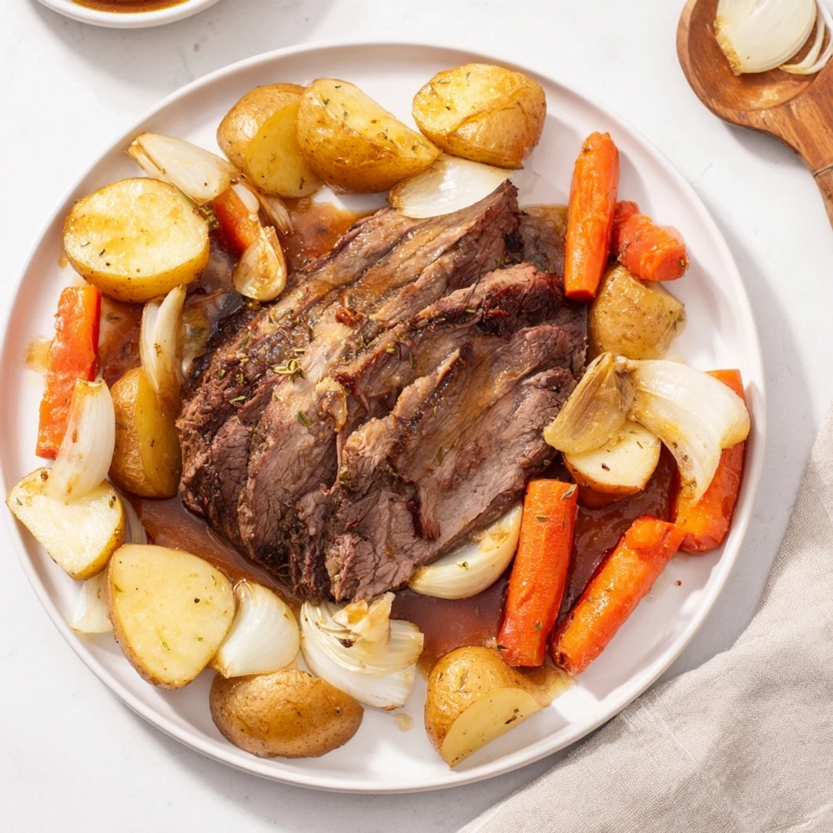 Golden-brown Sunday Pot Roast with tender vegetables, ready for a comforting family dinner.