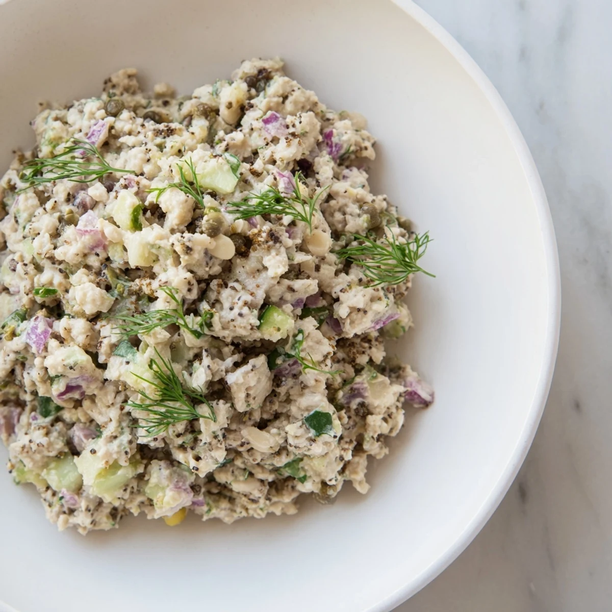 Creamy chickpea tuna salad, a vegan delight, ready for a sandwich filling or salad topping.
