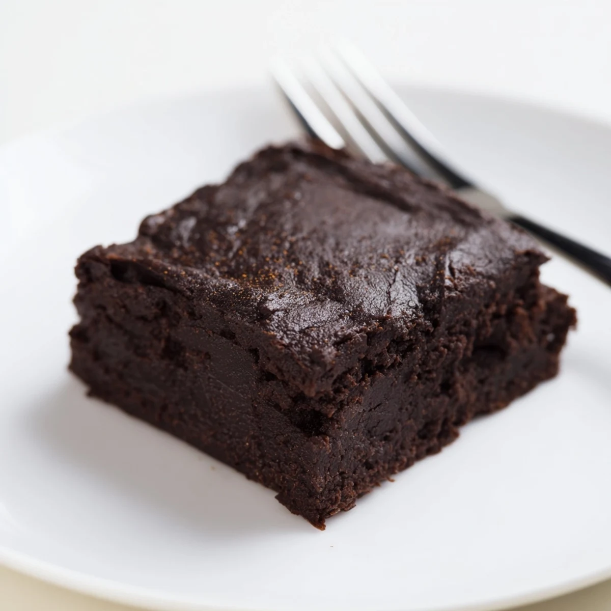 Perfectly square Pumpkin Workout Brownies with a fudgy texture, ideal for a post-workout recovery.