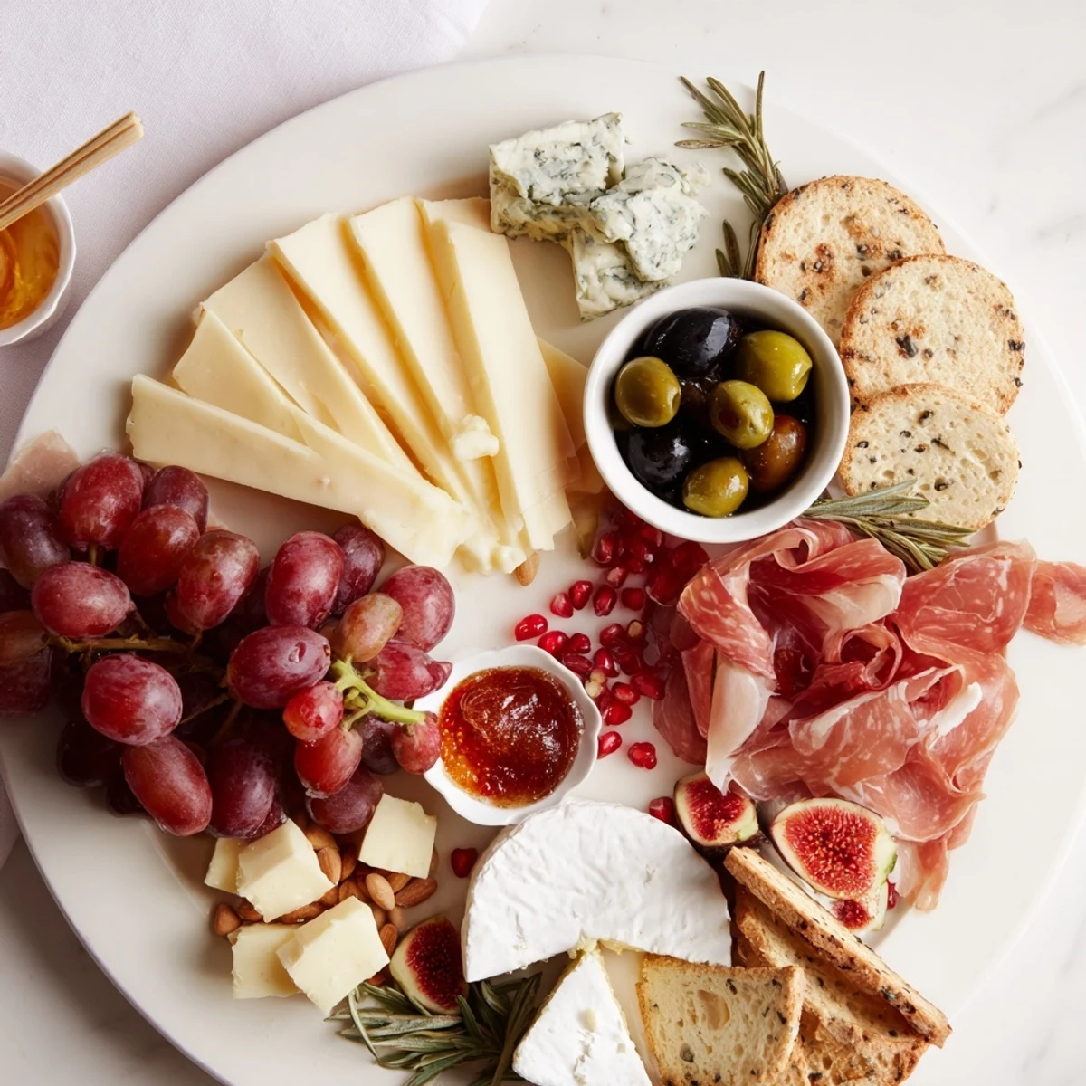 Visually stunning "The Final Curtain" grazing board overflowing with elegant cheeses and fruits.