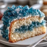 Teal and gold geode graduation cake with intricate sugar crystal details, perfect for honoring achievements with elegance and a modern artistic touch.