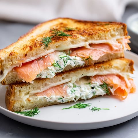Golden, melted Smoked Salmon Grilled Cheese oozing creamy cheese, perfect for a cozy lunch.