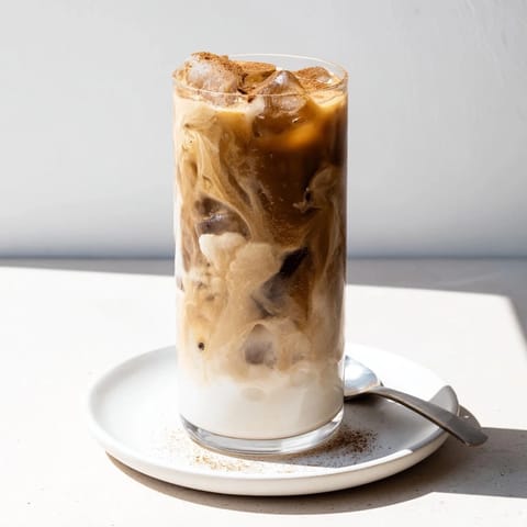 Nutty tahini iced coffee perfect for a hot day, served with chilled elegance.  