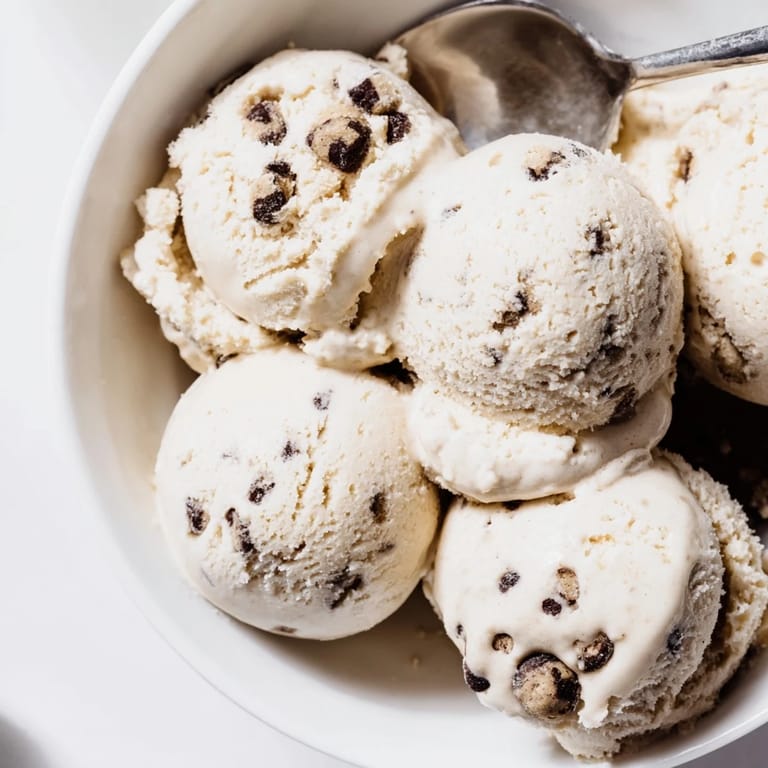 Indulge in cottage cheese ice cream loaded with rich cookie dough and chocolate chips.